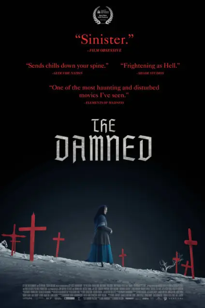 The Damned (2024) - Movie Poster. The movie poster for "The Damned" features a dark, eerie atmosphere with a black background. At the top, there are quotes from various sources praising the film, including "Sinister" from Film Obsessive, "Sends chills down your spine" from Geek Vibe Nation, and "Frightening as Hell" from Shade Studios. The title "THE DAMNED" is prominently displayed in the center in a gothic, white font. Below the title, a solitary figure dressed in dark clothing stands on a moonlit hill, surrounded by red crosses that add to the ominous and unsettling mood of the poster. The overall design conveys a sense of horror and suspense.