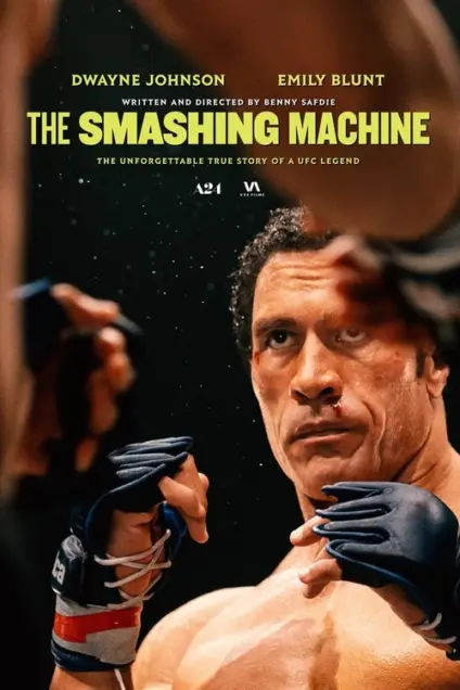 The Smashing Machine (2025) - Movie Poster. The movie poster features a muscular man in the foreground, wearing blue boxing gloves, with a determined expression on his face. The background is dark, with a blurred image of another person in the distance. The title "The Smashing Machine" is prominently displayed at the top in bold, yellow letters. Below the title, the names "Dwayne Johnson" and "Emily Blunt" are listed, indicating the main actors. The poster also includes the text "Written and Directed by Benny Safdie" and "The unforgettable true story of a UFC legend," suggesting that the film is based on a real-life story related to Ultimate Fighting Championship. The overall design conveys a sense of intensity and action.