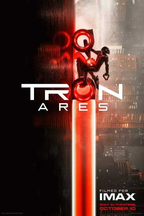 Tron: Ares (2025) - Movie Poster. The movie poster features a striking visual of a futuristic cityscape with a dark, industrial aesthetic. The title "TRON: ARES" is prominently displayed in bold, white letters, with the word "TRON" in a larger font and "ARES" below it. A central figure, clad in futuristic armor, is suspended in mid-air, seemingly in a dynamic pose, with a glowing red light emanating from their body. The background is a mix of dark, smoky tones and bright, contrasting lights, creating a sense of depth and intensity. The bottom of the poster includes text indicating that the film is "Filmed for IMAX" and "Only in Theaters October 10," suggesting a release date and the exclusive nature of the viewing experience.