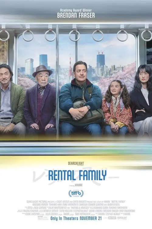 Rental Family (2025) - Movie Poster. The movie poster features a group of five individuals sitting side by side on a train, with a cityscape visible through the windows in the background. The characters are dressed in casual and semi-formal attire, suggesting a mix of personalities and possibly a family dynamic. The title "RENTAL FAMILY" is prominently displayed at the bottom of the poster, with additional text indicating that the film is an Academy Award-winning production starring Brendan Fraser. The poster also includes logos for Searchlight Pictures and TIFF, and a release date of November 21. The overall design conveys a sense of journey and connection among the characters.