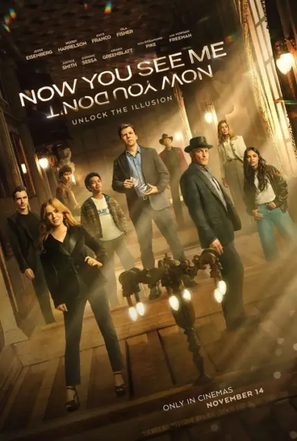 Now You See Me: Now You Don't (2025) - Movie Poster. The movie poster features a group of eight individuals standing in a dimly lit, ornate room with wooden floors and intricate ceiling details. The characters are dressed in a mix of formal and casual attire, suggesting a blend of mystery and sophistication. In the foreground, a mechanical device with glowing lights is prominently displayed, hinting at a theme of magic or illusion. The text at the top reads "NOW YOU SEE ME, NOW YOU DON'T" in bold, white letters, followed by "UNLOCK THE ILLUSION" in smaller text. At the bottom, it states "ONLY IN CINEMAS NOVEMBER 14," indicating the release date. The overall aesthetic is mysterious and intriguing, with a focus on the characters and the central mechanical device.