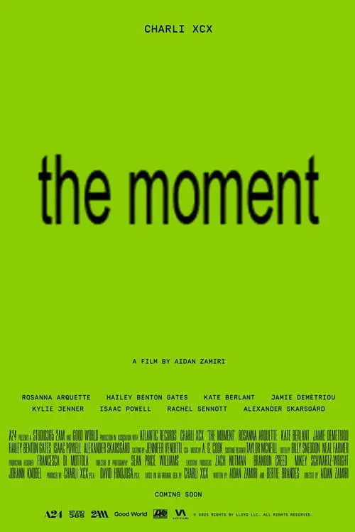 The Moment (2026) - Movie Poster. The movie poster is predominantly green with the title "the moment" prominently displayed in large, bold black letters in the center. Above the title, the name "Charli XCX" is written in smaller white text. Below the title, the names of the cast members are listed in smaller white text, including Rosanna Arquette, Hailey Benton Gates, Kate Berlant, Jamie Demetriou, Kylie Jenner, Isaac Powell, Rachel Sennott, and Alexander Skarsgård. The director's name, Aidan Zamiri, is also mentioned in white text. The poster includes additional credits for production companies, such as A24, StudioCanal, and Good World, and mentions that the film is produced in association with Atlantic Records. The bottom of the poster indicates that the film is "coming soon" and includes logos for A24, StudioCanal, and Good World.