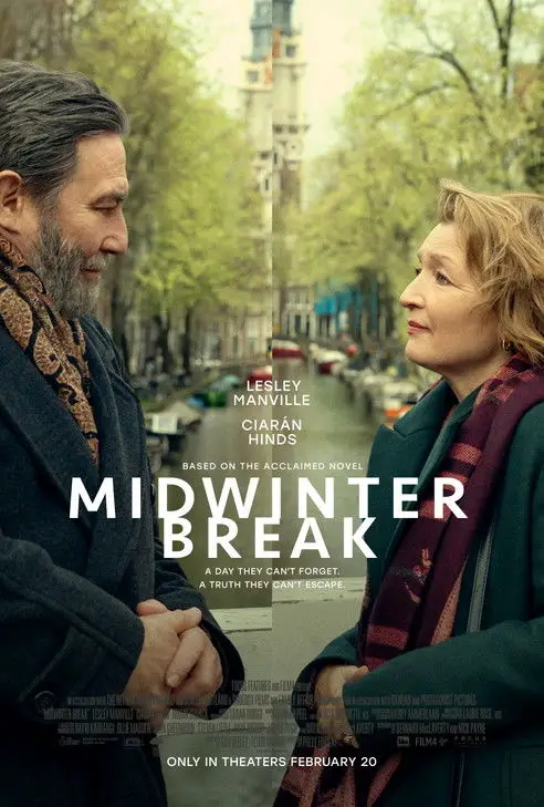 Midwinter Break (2026) - Movie Poster. The movie poster features two individuals standing close to each other, facing each other with a serene and contemplative expression. The man on the left has gray hair and a beard, wearing a dark coat and a scarf with a patterned design. The woman on the right has blonde hair and is dressed in a green coat with a red scarf. They are set against a backdrop of a picturesque canal in Amsterdam, with trees lining the canal and a tall building in the distance. The text on the poster reads "Midwinter Break," with the names "Lesley Manville" and "Ciarán Hinds" listed below it. The tagline states, "A day they can't forget. A truth they can't escape." The poster also indicates that the movie is "Only in theaters February 20."