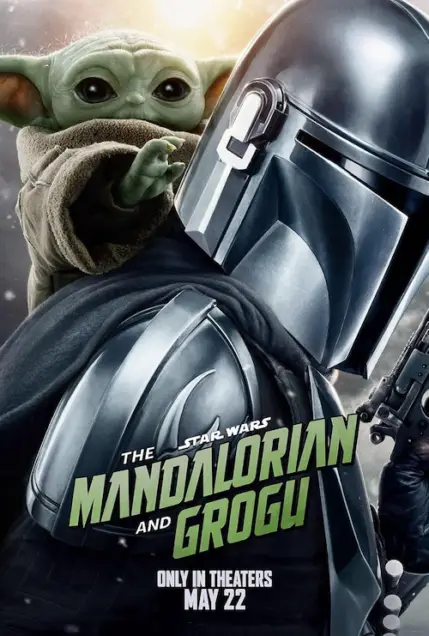 Star Wars: The Mandalorian and Grogu (2026) - Movie Poster. The movie poster features a green, furry creature with large, expressive eyes and a small, rounded head, which resembles Yoda from the Star Wars franchise. The creature is wearing a brown, hooded cloak and appears to be peeking over the shoulder of a Mandalorian, a character known for their distinctive black armor and helmet. The Mandalorian is holding a blaster rifle and is standing in a dark, starry background. The text on the poster reads "The Mandalorian and Grogu," indicating the title of the movie, and "Only in theaters May 22," suggesting the release date. The overall design combines elements of adventure and fantasy, hinting at an epic journey involving these two characters.