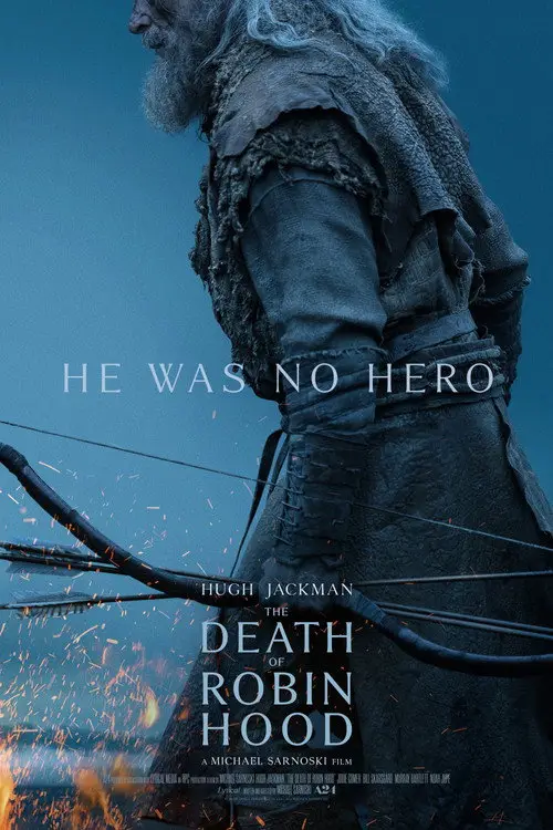 The Death of Robin Hood (2026) - Movie Poster. The movie poster features a man dressed in medieval armor, holding a bow and arrow. The background is a dark, moody sky with sparks flying, suggesting a dramatic or intense scene. The text on the poster reads, "He was no hero," followed by "Hugh Jackman" and "The Death of Robin Hood," indicating the title of the film. The poster also includes the director's name, Michael Sarnoski, and the production company, A24. The overall tone of the poster is dark and somber, hinting at a story that challenges traditional notions of heroism.